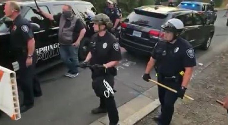 In Springfield, Oregon, the police came, and they confronted the protesters. Footage of the altercation was shared by Cameron Ollivant to Facebook. The footage shows the police officers fighting the protesters, sending two men to the hospital, after breaking their noses.