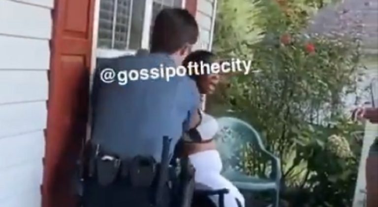 A black woman was on the front porch of her home, talking with friends, when a police officer approached her. Claiming she was talking too loudly, the officer came and quickly began harassing her over not wearing a mask. The situation quickly escalated with the officer grabbing the woman, dragging her to the ground, tasering, and then arresting her, over not wearing a mask, while he wasn't wearing one, either.