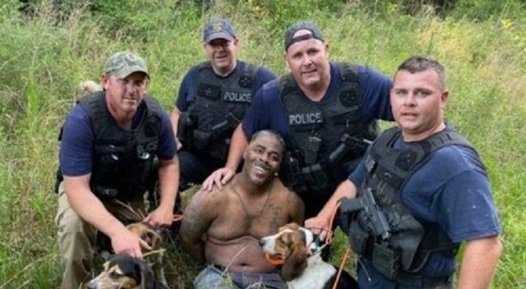 Eric Boykin Mississippi arrest police dogs pose pic