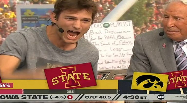 College football fans chant take a shower at Ashton Kutcher as he adds commentary during Iowa State game