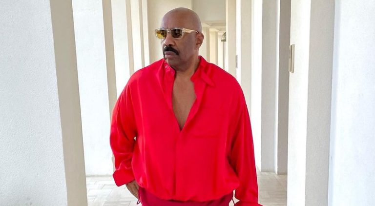Steve Harvey rocks Virgil Abloh Louis Vuitton red outfit with his chest out