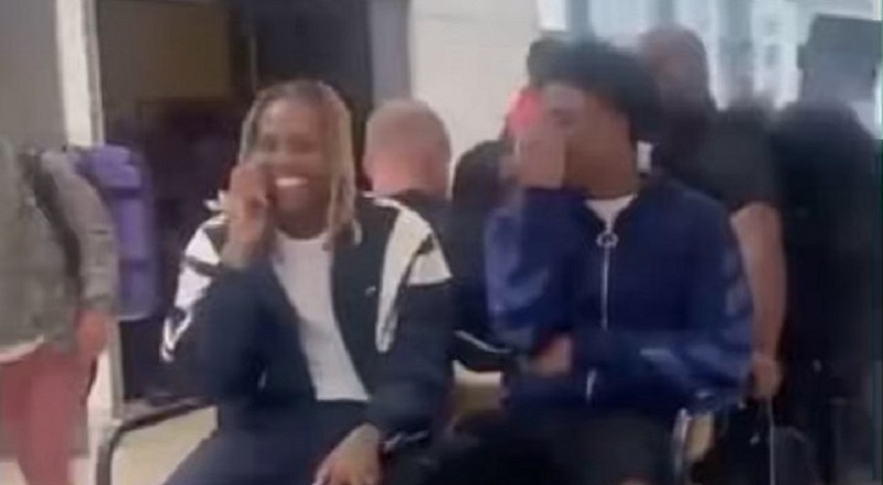 Lil Durk spotted at the airport by fans riding the golf cart