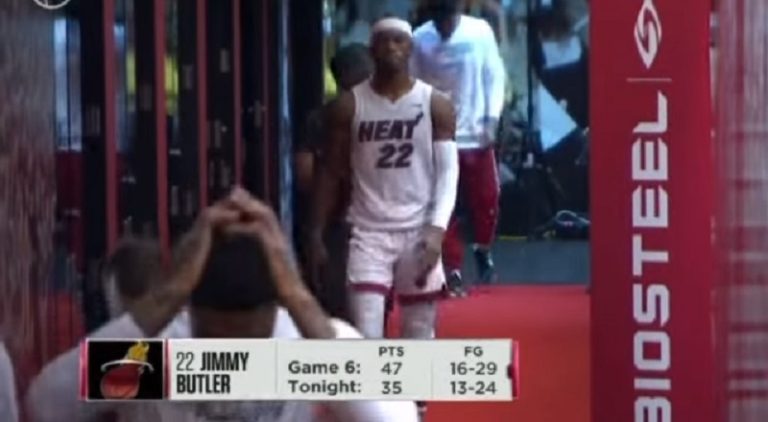 Jimmy Butler walks off after the Heat lose Game 7