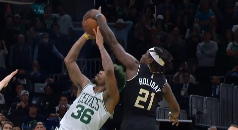 Jrue Holiday blocks and steals ball from Marcus Smart to give Bucks win