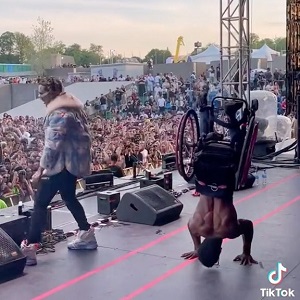 Lil Pump brings a man in a wheelchair on stage during his concert