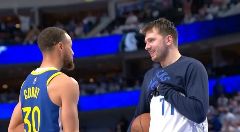 Stephen Curry and Luka Doncic talk while the Mavericks' roof leaks