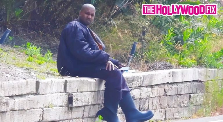 Kanye West spotted sitting by himself on the side of the road