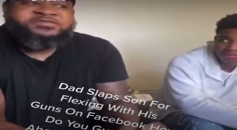 Father slaps his son's face for posing with his guns on Facebook