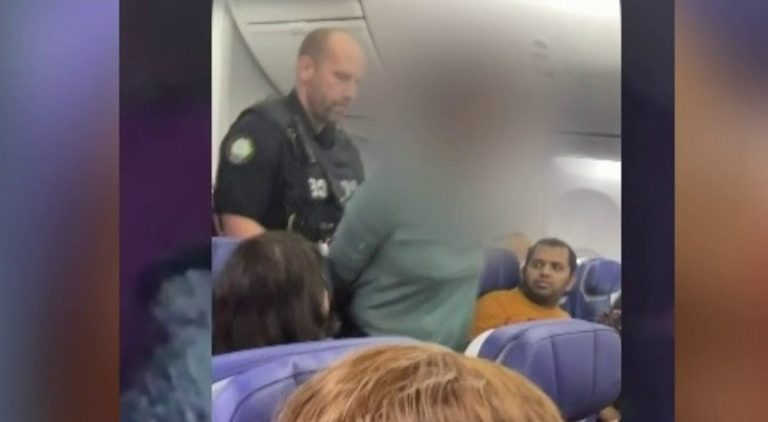 Woman claims Jesus told her to open airplane exit door