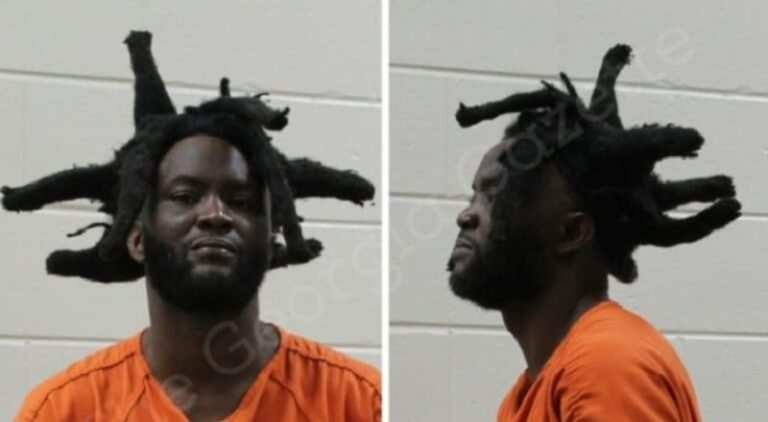 Man goes viral for wearing wild dreads in his mugshot