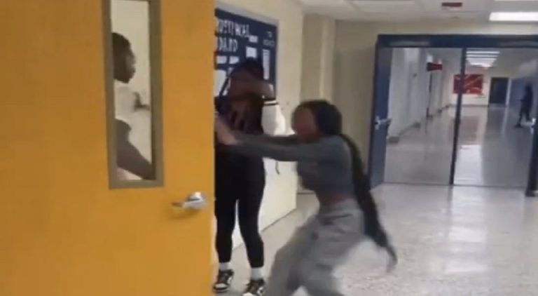 Male teacher shoves female student to the ground