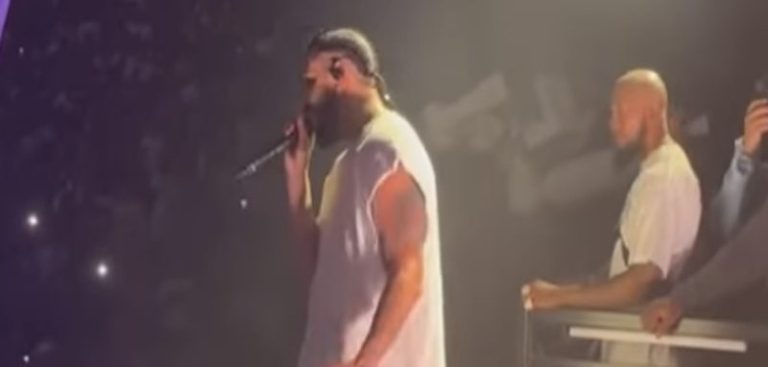 Fan throws phone on stage during Drake's Chicago concert