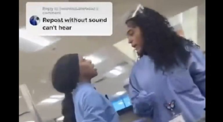 Nurses get into argument while patient lays beside them