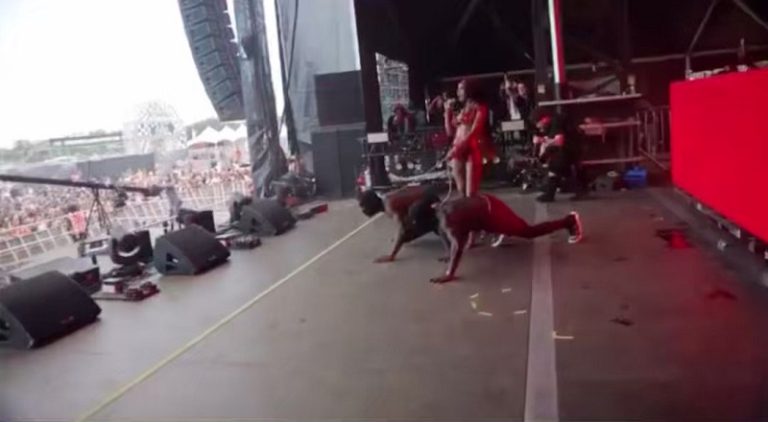 Sexxy Red walks men out on leashes to start performance
