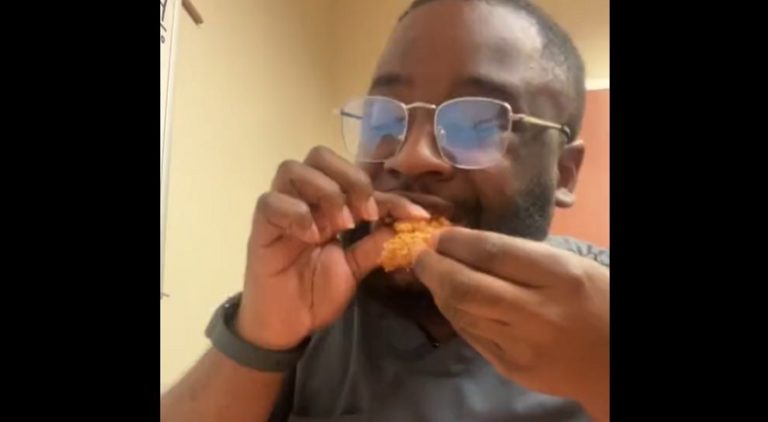 Man records himself eating Popeye's and eats biscuit in one bite