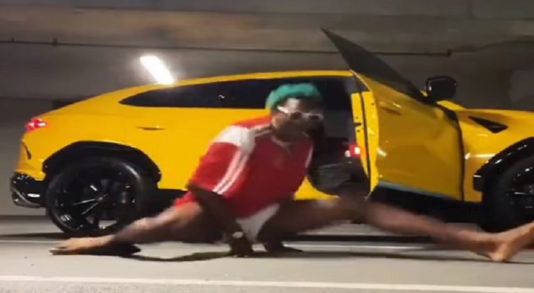 NBA star Kai Jones dances and does a split in a parking lot