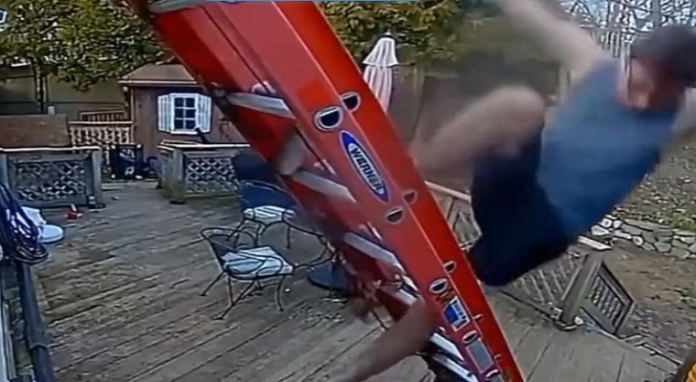 Man falls off the ladder and flat on his face