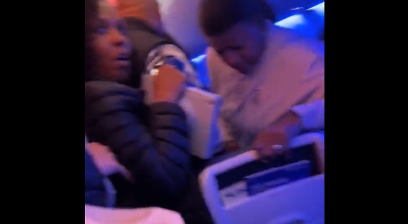 Man opens airplane door and jumps on wing forcing landing