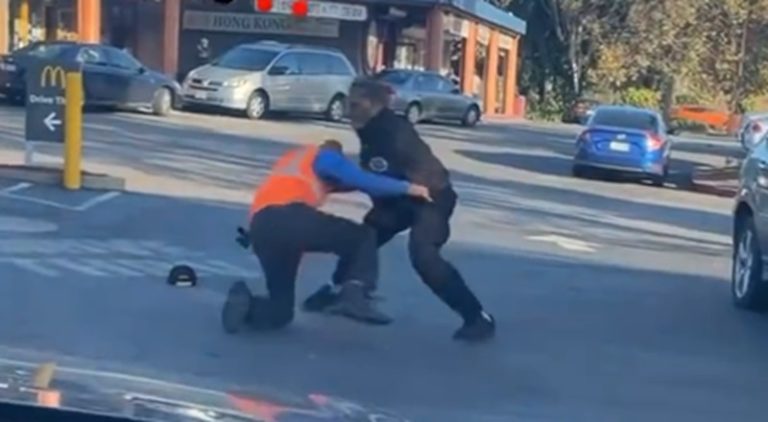 Two older men fight in McDonald's parking lot