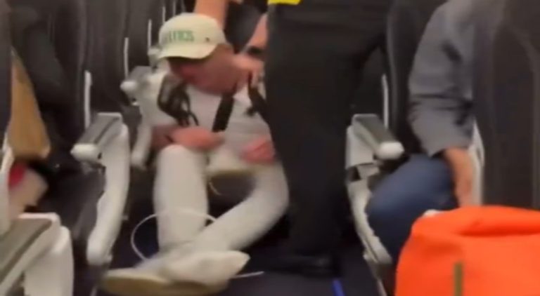 Man beats a guy on an airplane who was harassing him