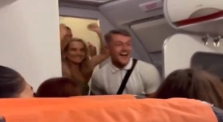 Airplane passengers celebrate couple joining Mile High Club