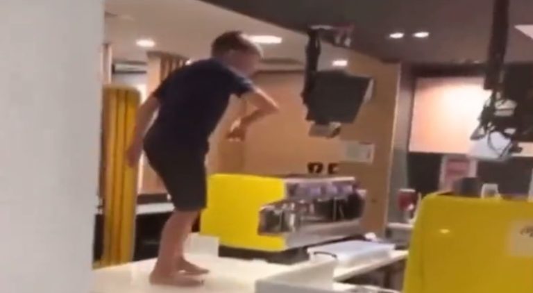 Disrespectful child throws food on McDonald's employee