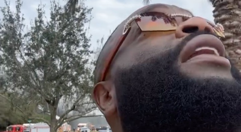 Rick Ross orders Wingstop while watching fire at Tyreek Hill's house